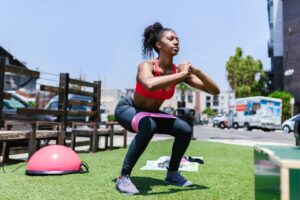 women doing summer workout in a park